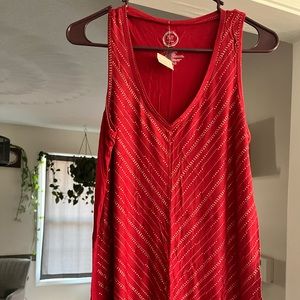 New with tags, size medium tank. Smoke free home